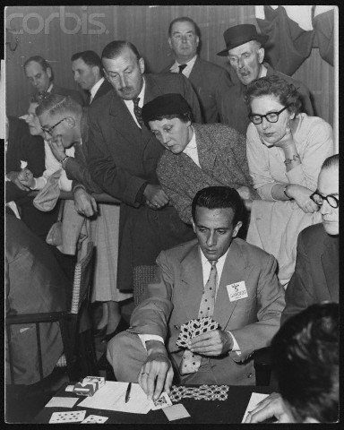 October 1957, London, England, UK --- Benito Garozzo plays a tense game of cards in the British Bridge World 