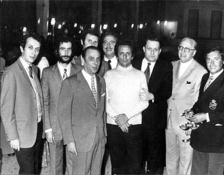Belladonna, Garozzo, Forquet, d'Alelio and Vivaldi, captained by Mr. Perroux, pose with the Chairman of the Monaco Bridge Federation